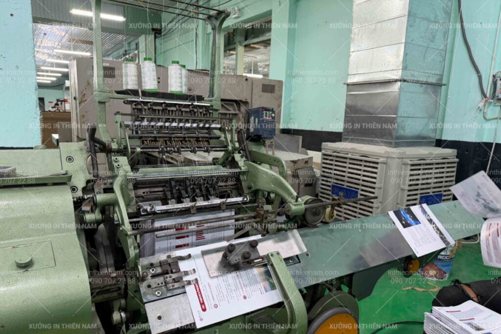 Máy may chỉ 1